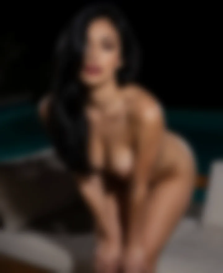 Mitra, a private photo, blurred until unlocked